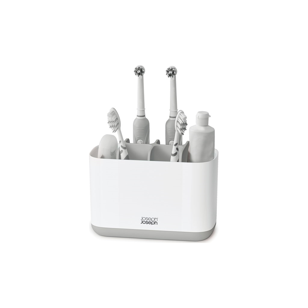 Un porta spazzolino bianco e grigio con due spazzolini elettrici, due manuali e un tubetto di dentifricio.
