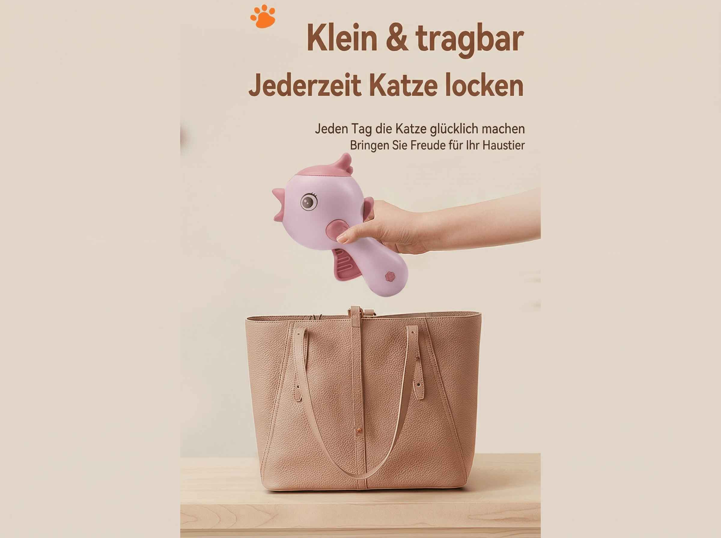 Hand hält pinke Katzenangel über einer rosafarbenen Tasche.