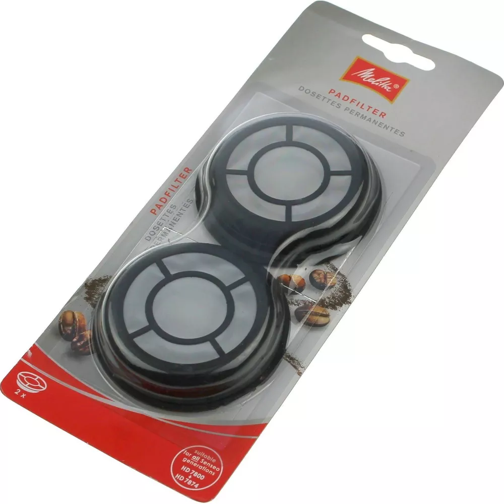 Verpackung mit zwei Melitta Padfiltern, schwarz und weiß, mit Kaffeebohnen.