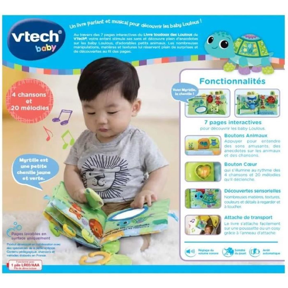 Dziecko trzyma interaktywną książkę Vtech ze zwierzętami i piosenkami.