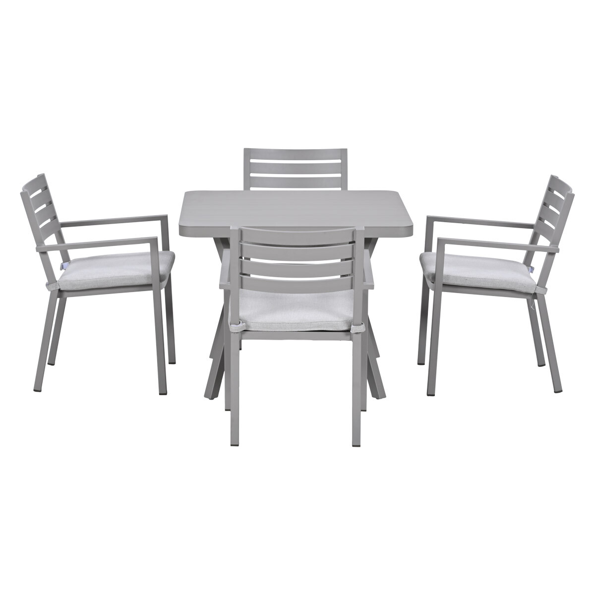 Grijze buitentafel met vier stoelen met lichtgrijze kussens.