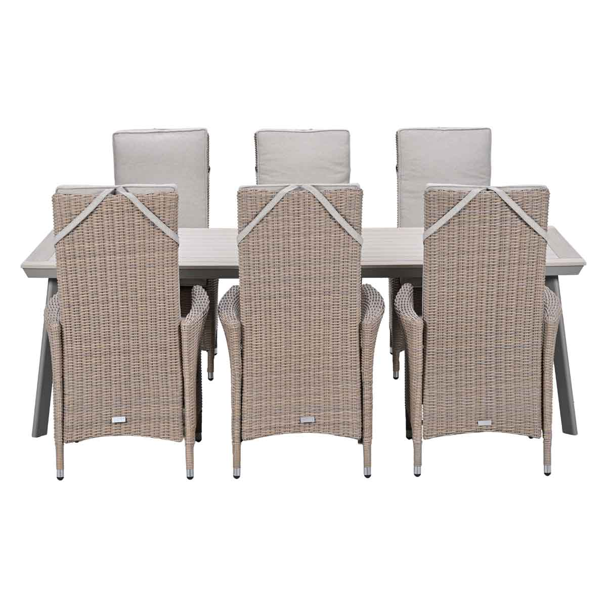 A light wood dining table with six beige rattan chairs.
