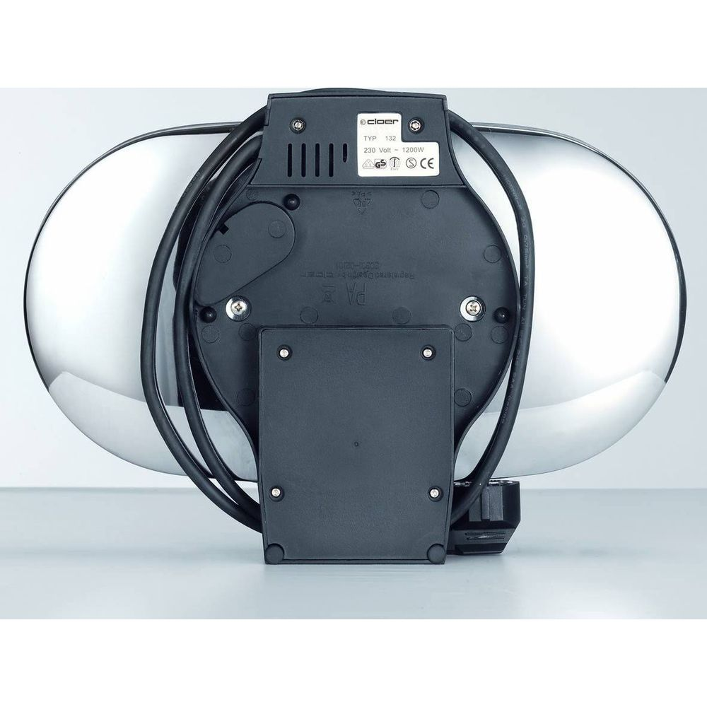 Tył polerowanego metalowego urządzenia z czarnym kablem i tabliczką znamionową.