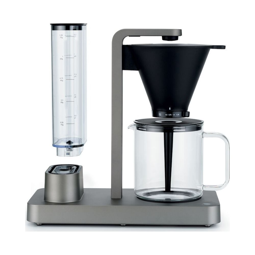 Una moderna macchina da caffè con caraffa in vetro e serbatoio acqua trasparente.