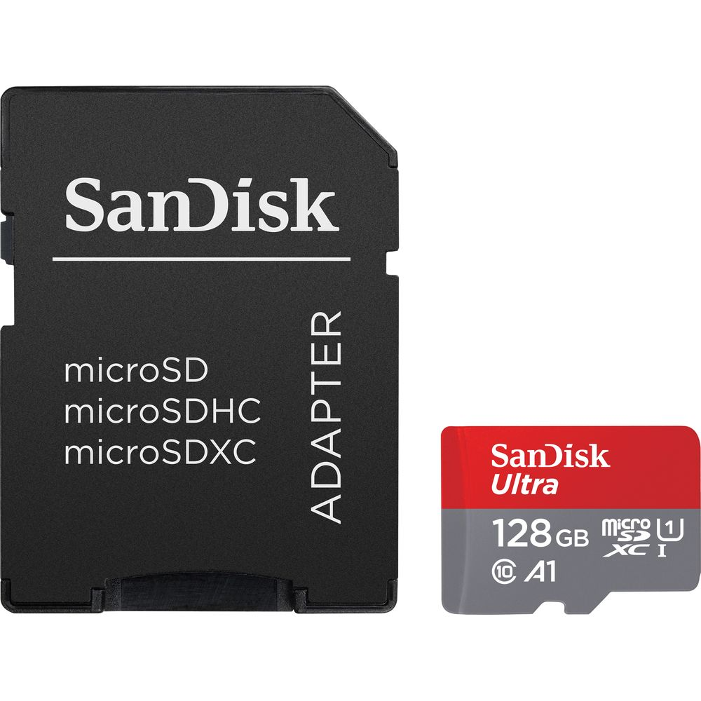 Ein schwarzer Adapter und eine rote microSD-Karte von SanDisk liegen nebeneinander.