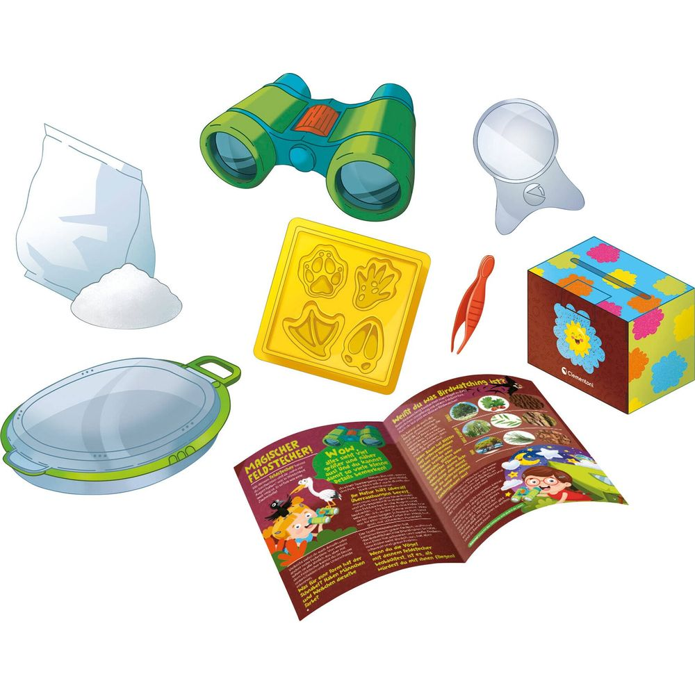 Ein Set mit Fernglas, Lupe, Pinzette, Gießform, Buch und mehr.