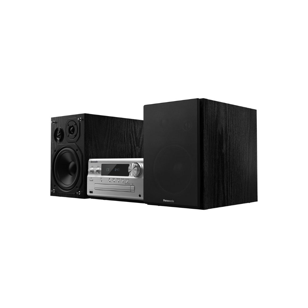 Récepteur CD argenté avec deux enceintes noires en bois. Fond blanc.
