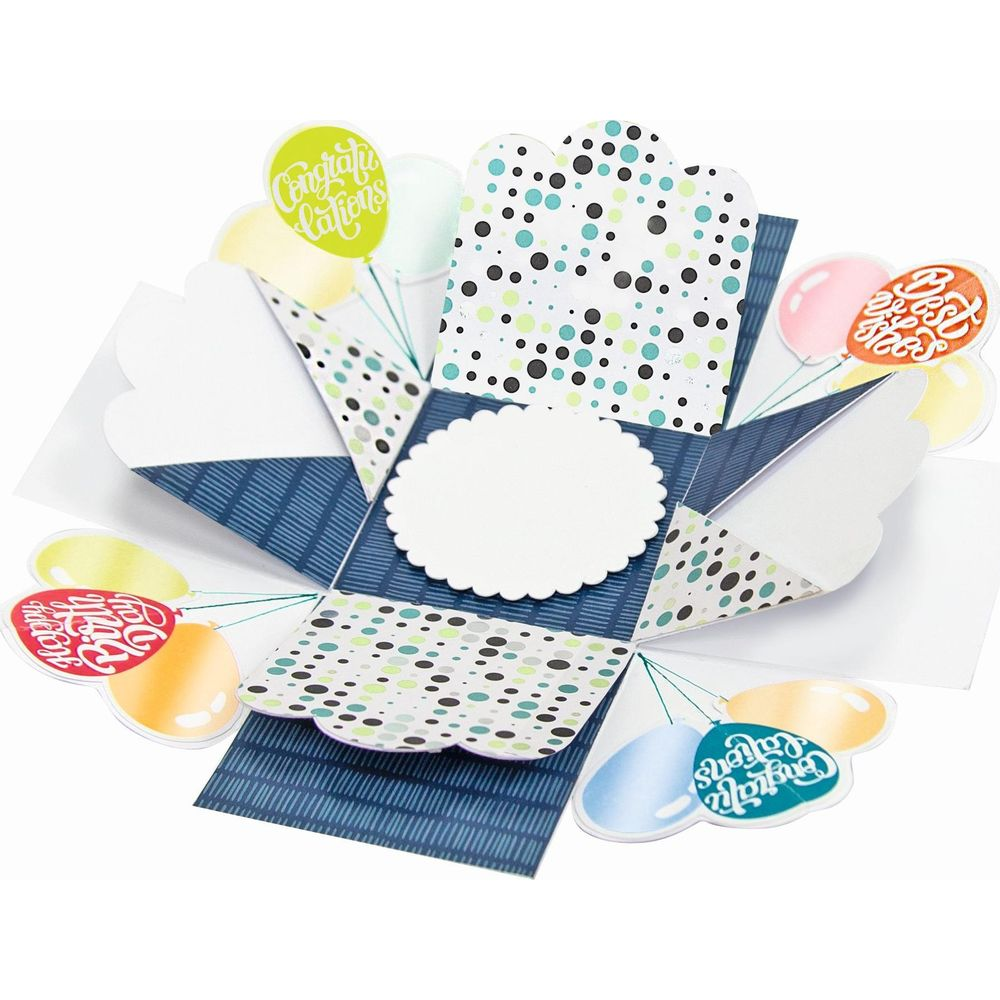 Pudełko eksplodujące z balonami i gratulacjami na niebieskim tle.