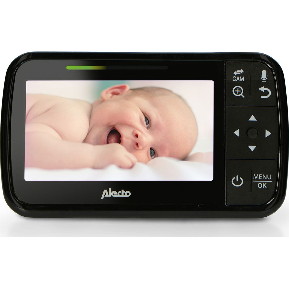 Baby monitor screen shows a smiling baby on a white surface.