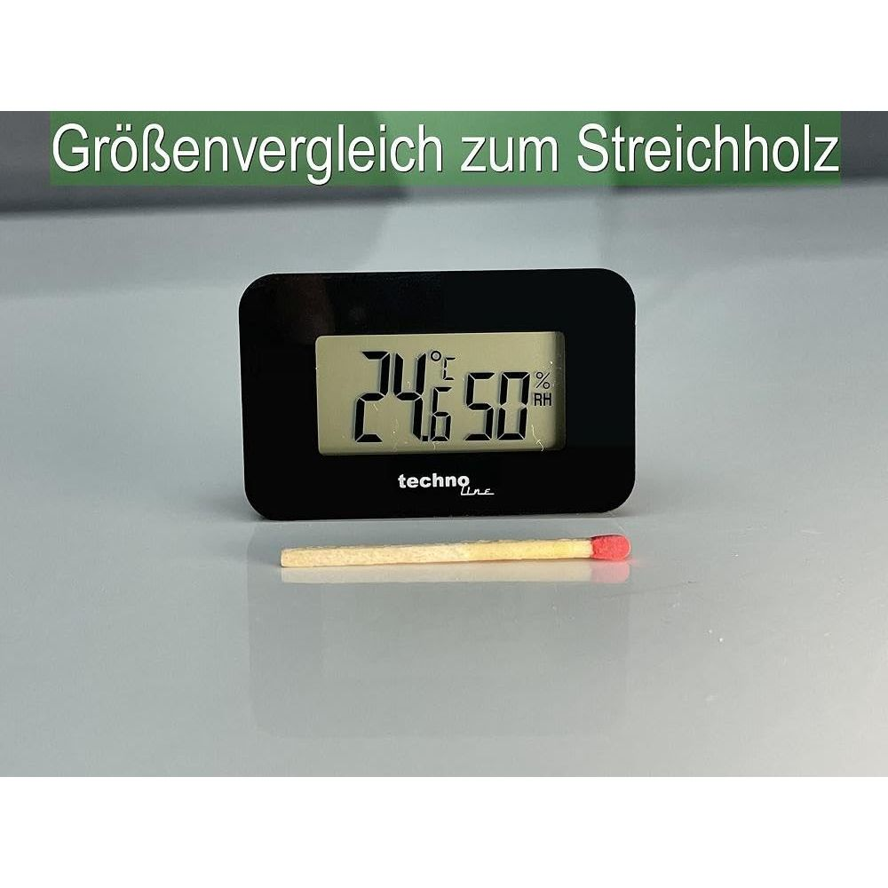 Ein digitales Thermometer/Hygrometer zeigt 24,6°C und 50% RH neben einem Streichholz.