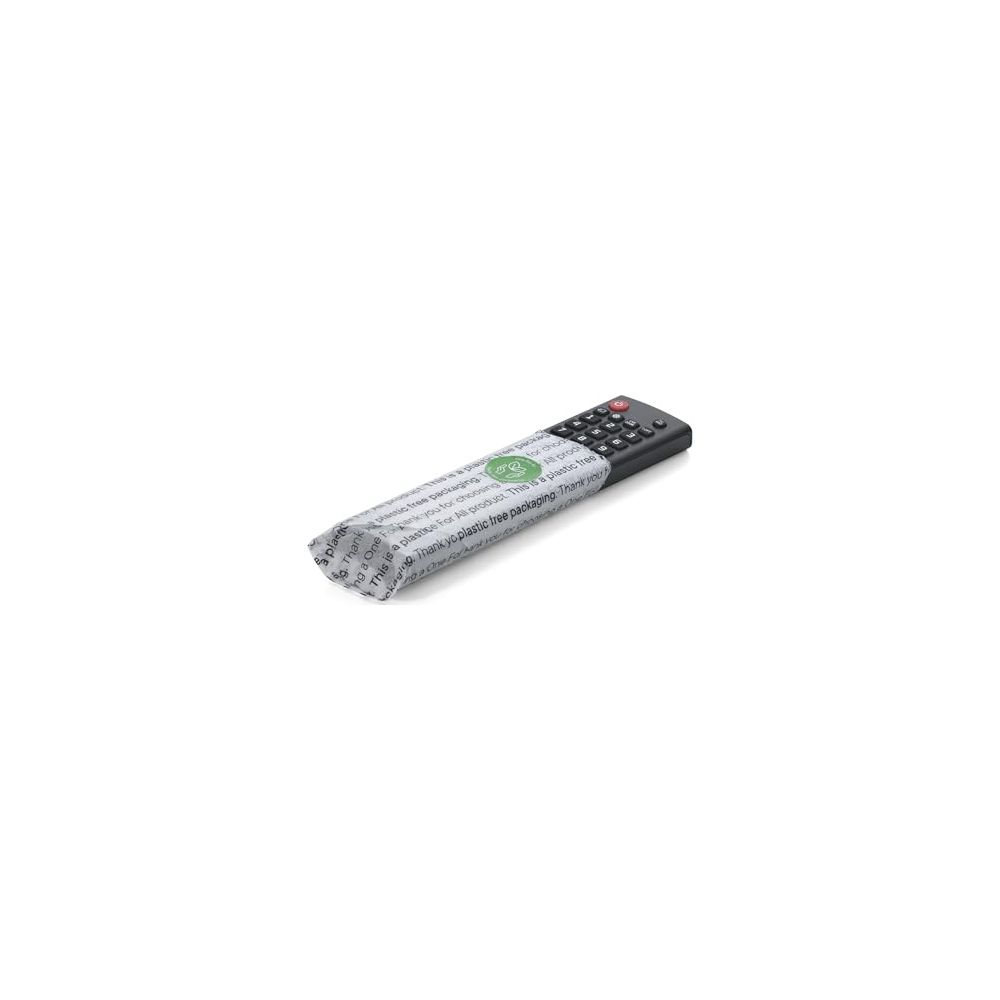 A black remote control wrapped in plastic-free packaging with text.