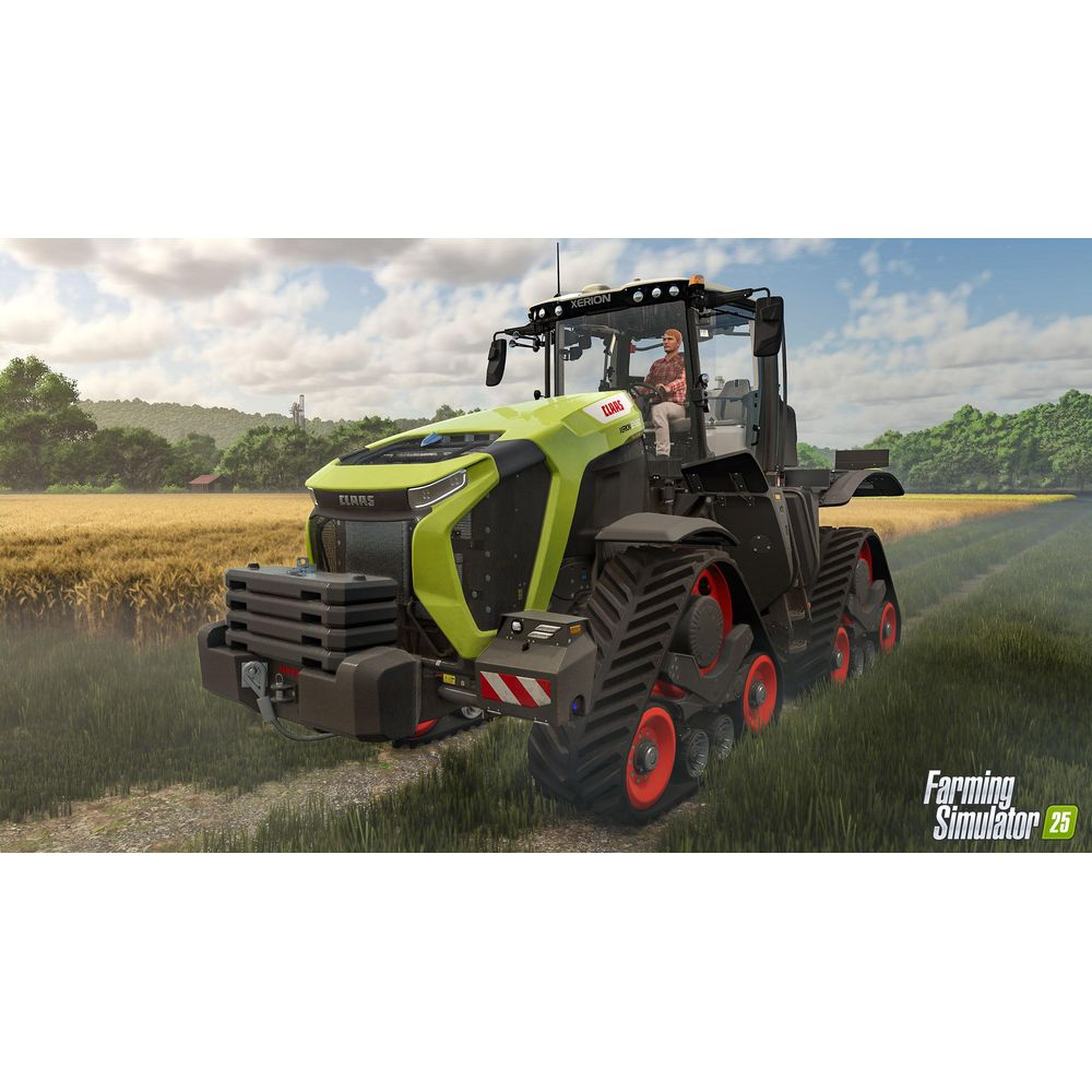 Un trattore CLAAS XERION verde con cerchi rossi guida su un campo. Principalmente erba e grano.