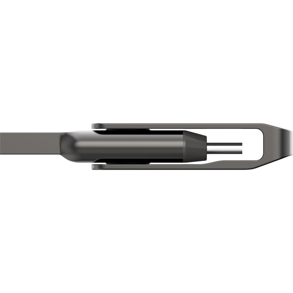 Widok z góry szarego metalowego złącza z dwoma pinami i strukturą przypominającą widelec.