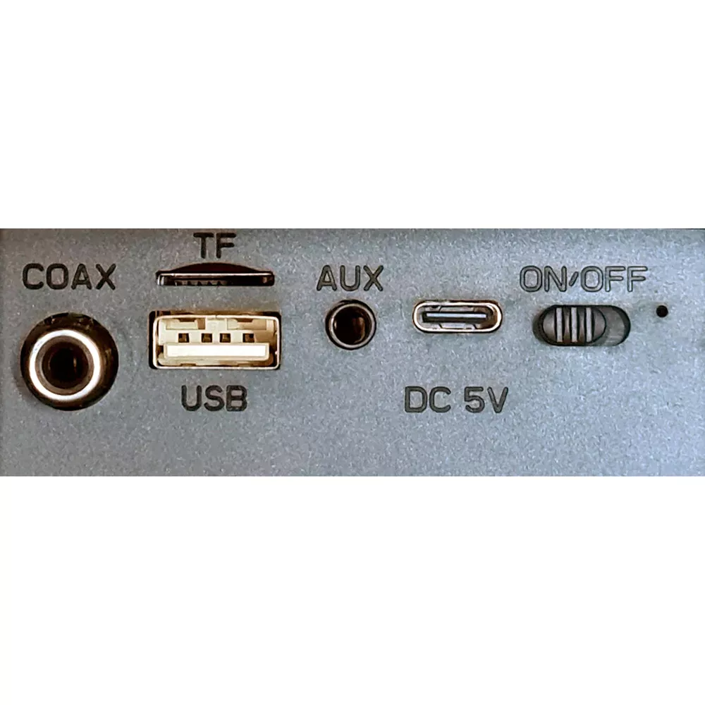 Ports : Coax, TF, USB, Aux, DC 5V, interrupteur On/Off.