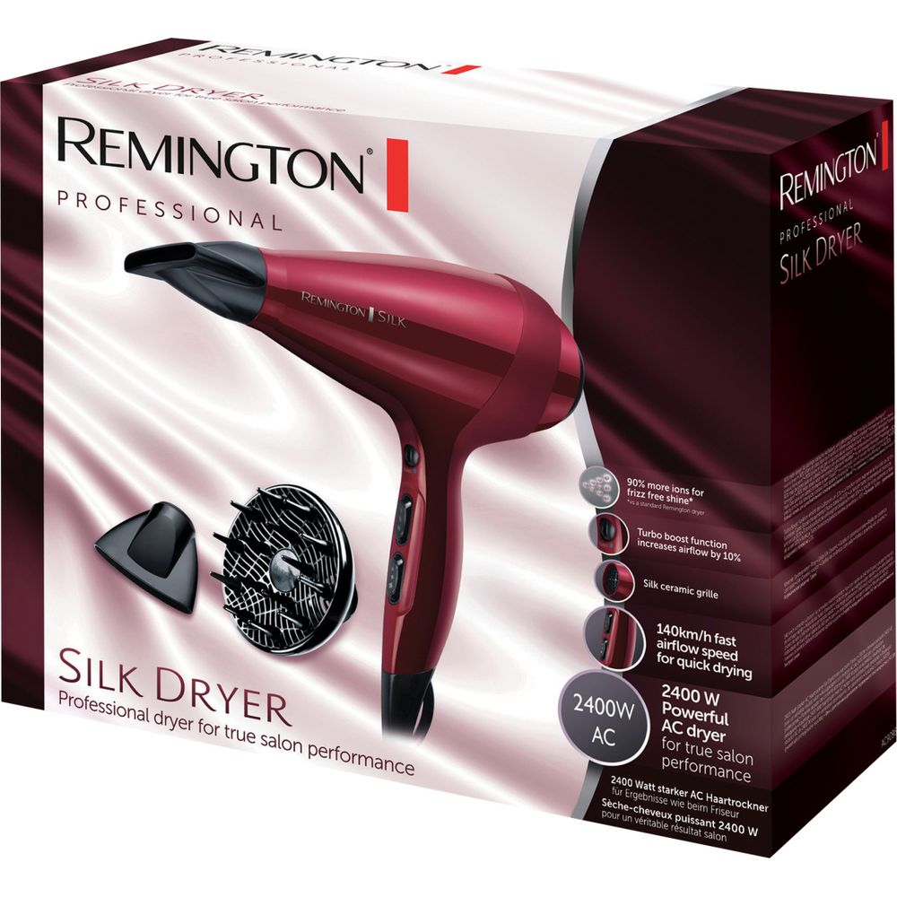 Roter Remington Silk Haartrockner mit Zubehör auf Produktverpackung.