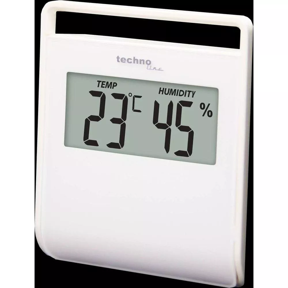 Un thermomètre numérique blanc affiche 23 degrés Celsius et 45% d'humidité.