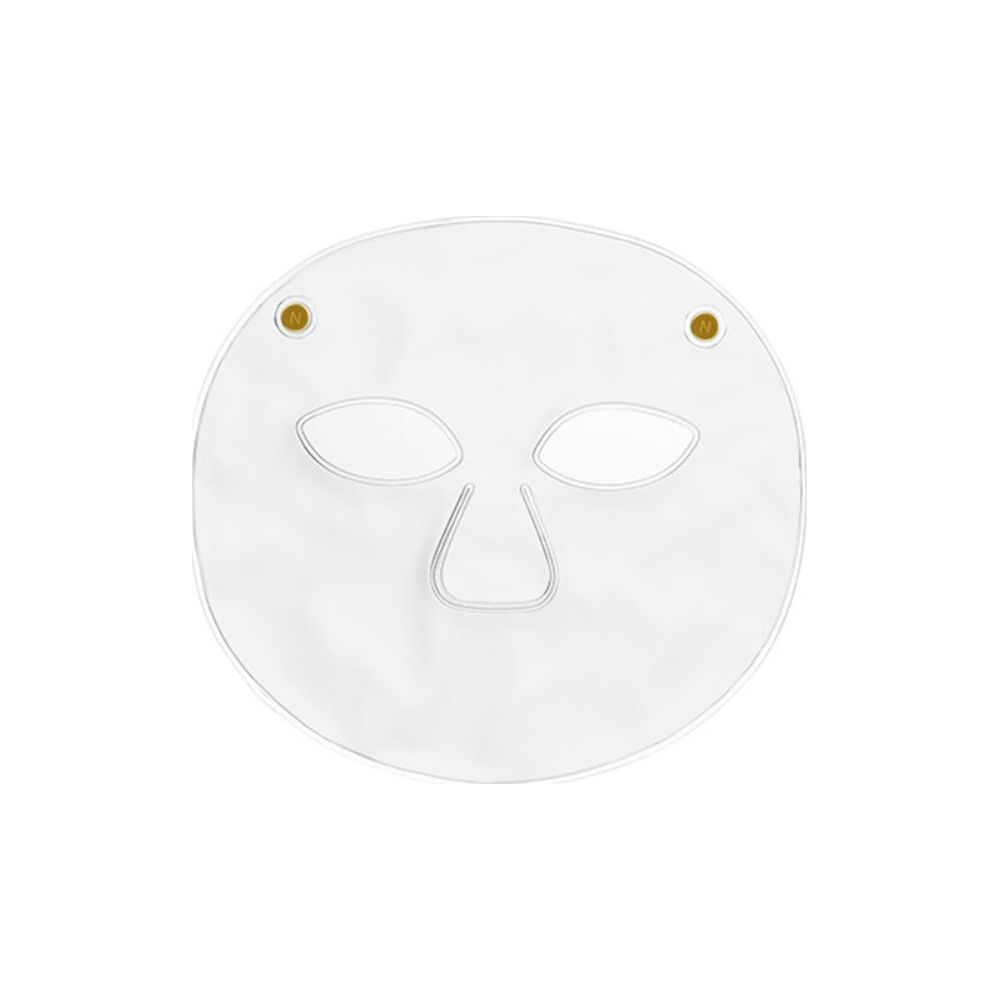 Transparente Gesichtsmaske mit Augen- und Mundöffnungen und goldenen Akzenten.