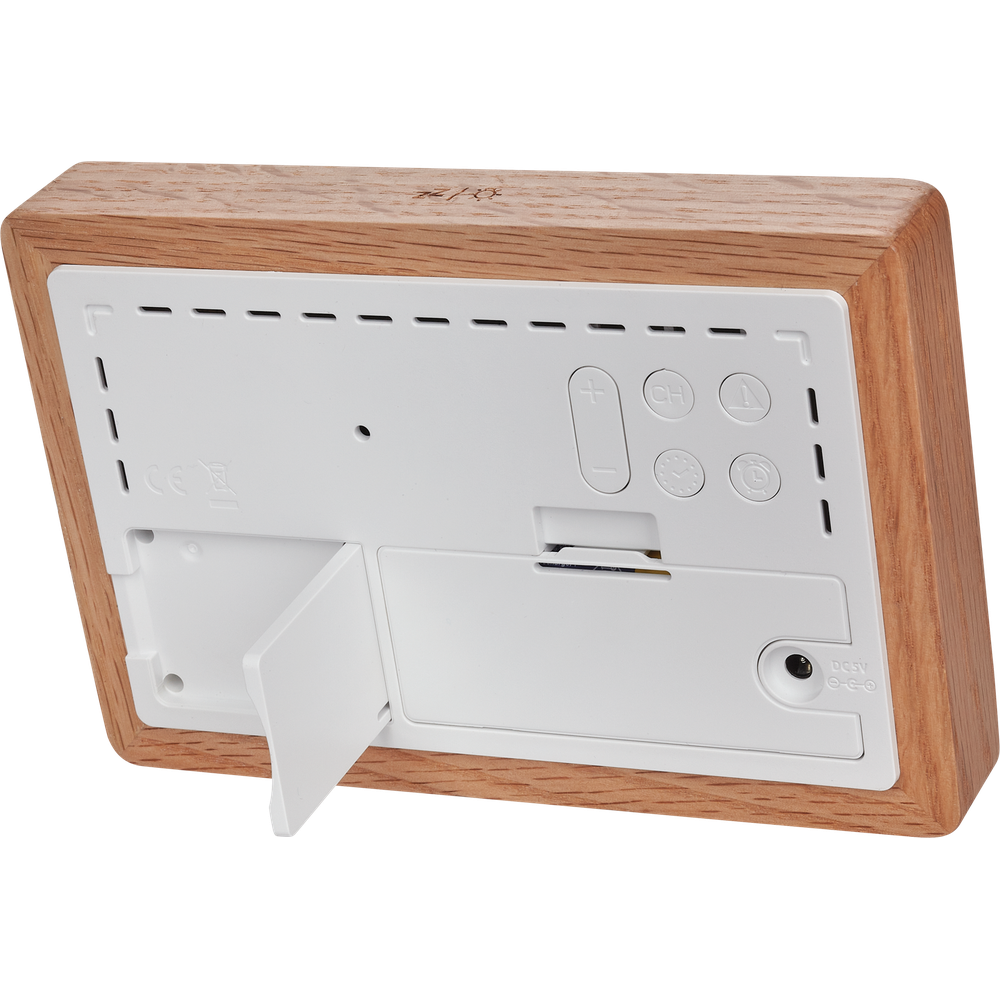 Rückseite eines Holzweckers mit Tasten und Batterieabdeckung.
