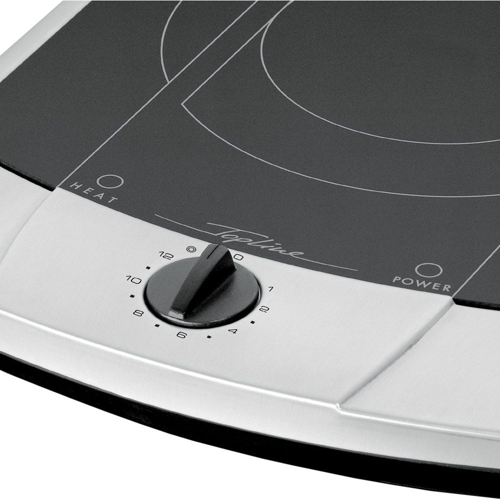 Ein Kochfeld mit einem schwarzen oberen und einem silbernen unteren Teil.