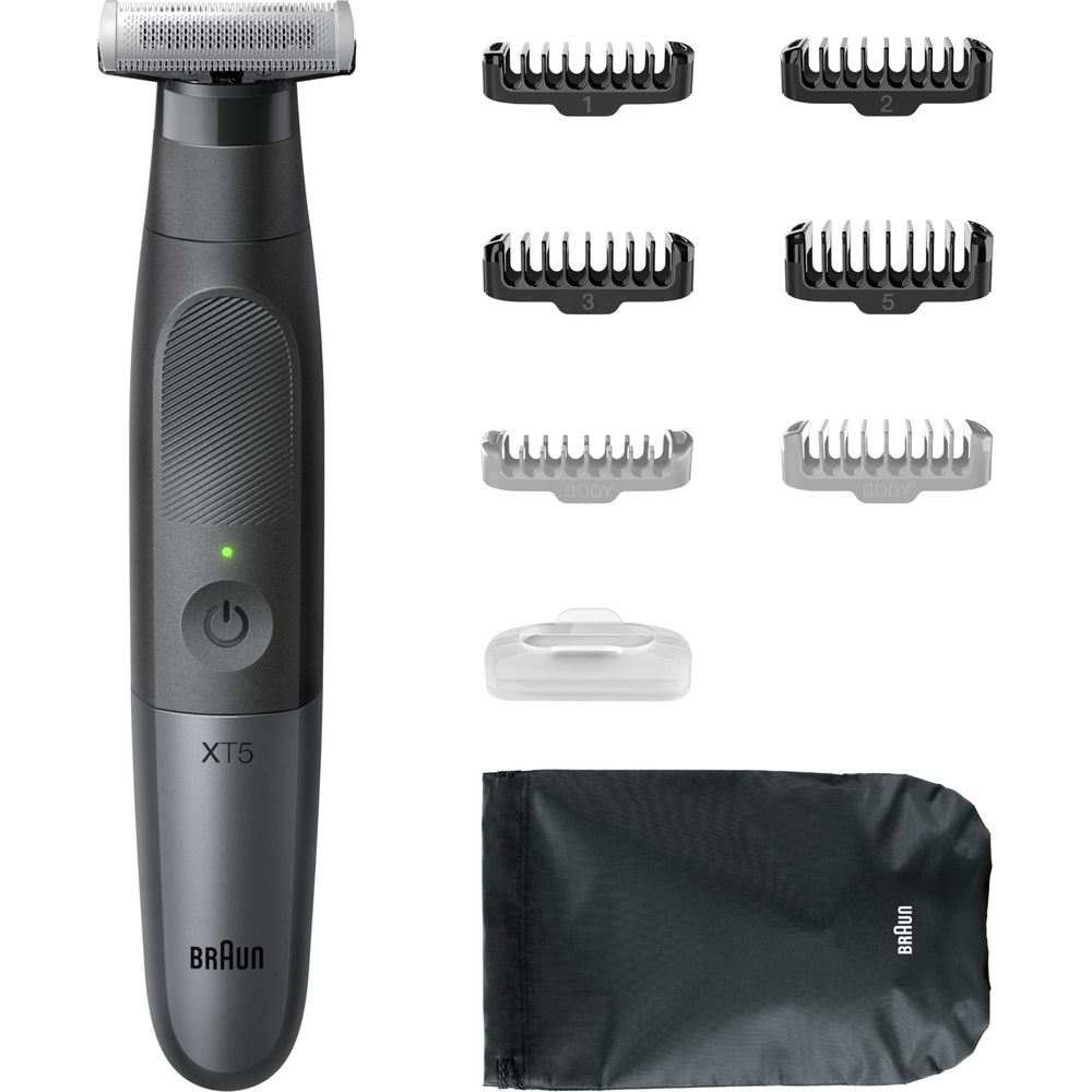 Un rifinitore Braun scuro con accessori, caricabatterie e custodia.