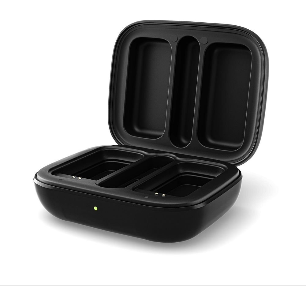 Czarna, otwarta ładowarka do słuchawek z trzema przegrodami.