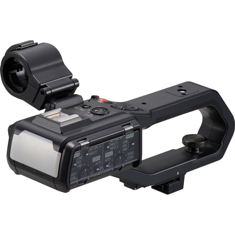 Un'impugnatura per fotocamera nera con ingressi audio e controlli.