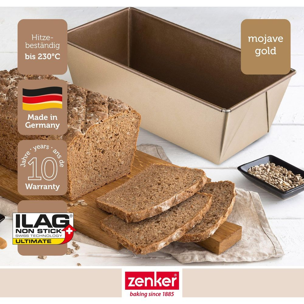 Ein goldfarbener Kasten für Brot und geschnittenes Brot daneben.