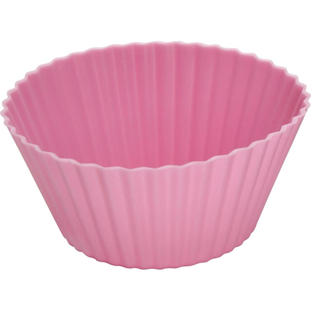 Eine einzelne rosa Silikon-Muffinform mit gerippten Seiten.