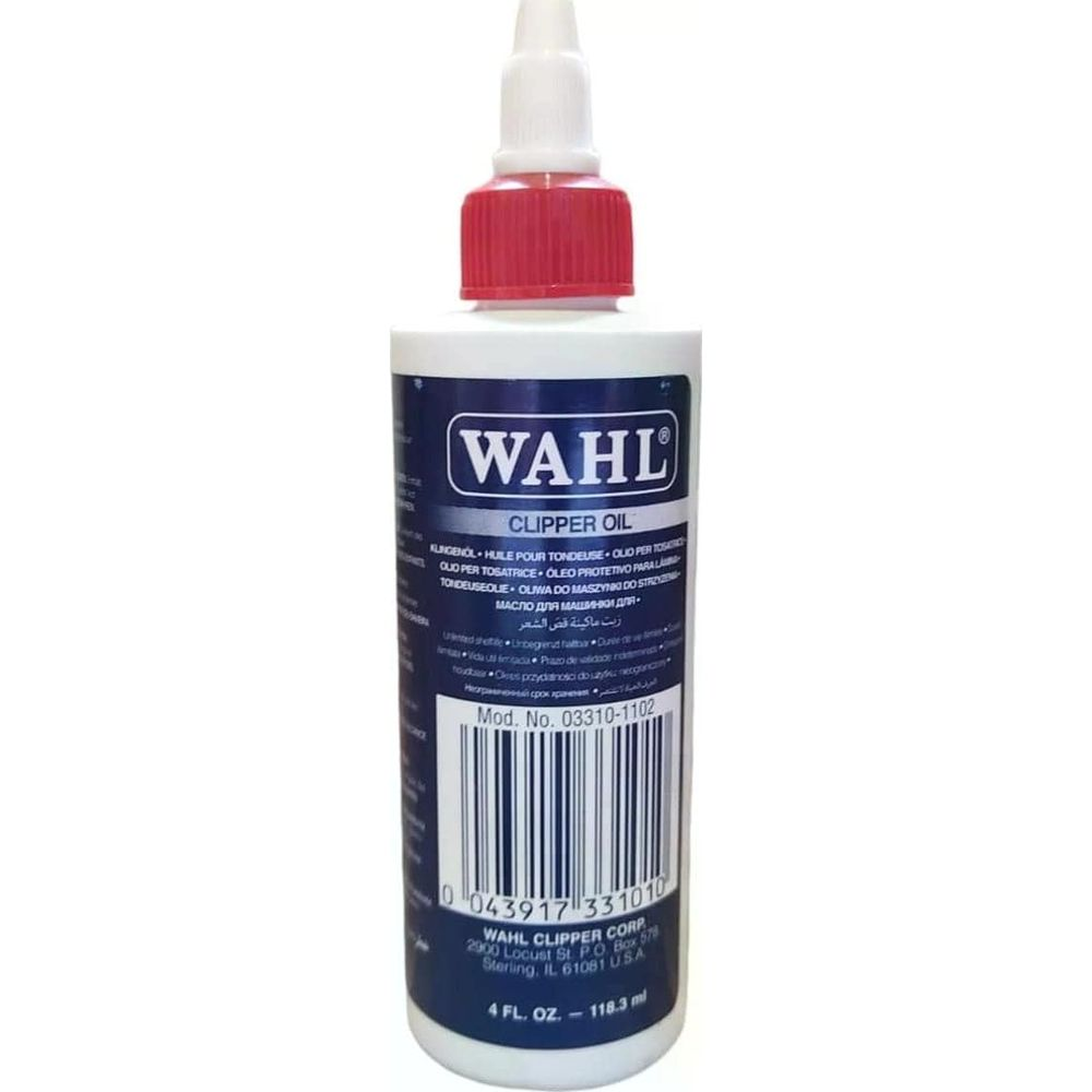Botella de Wahl Clipper Oil con tapa roja y pico blanco.