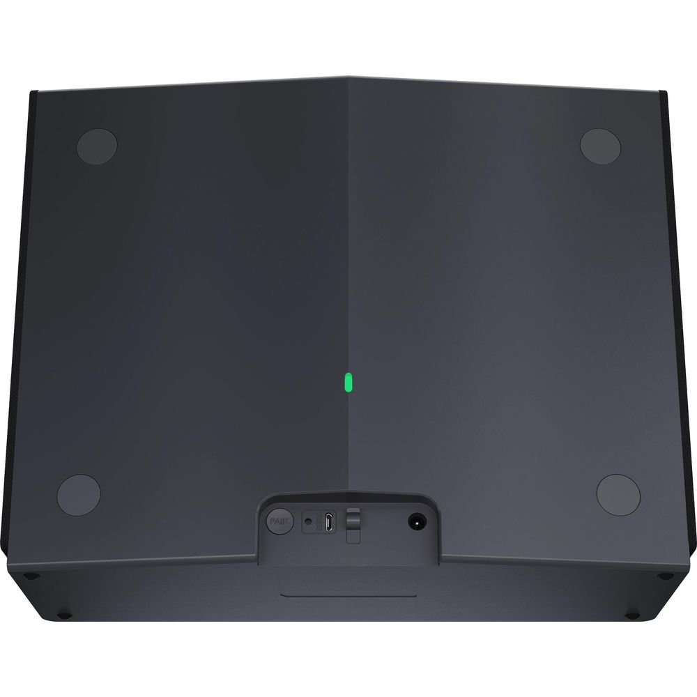 Dispositivo electrónico gris oscuro con luz verde y puertos.