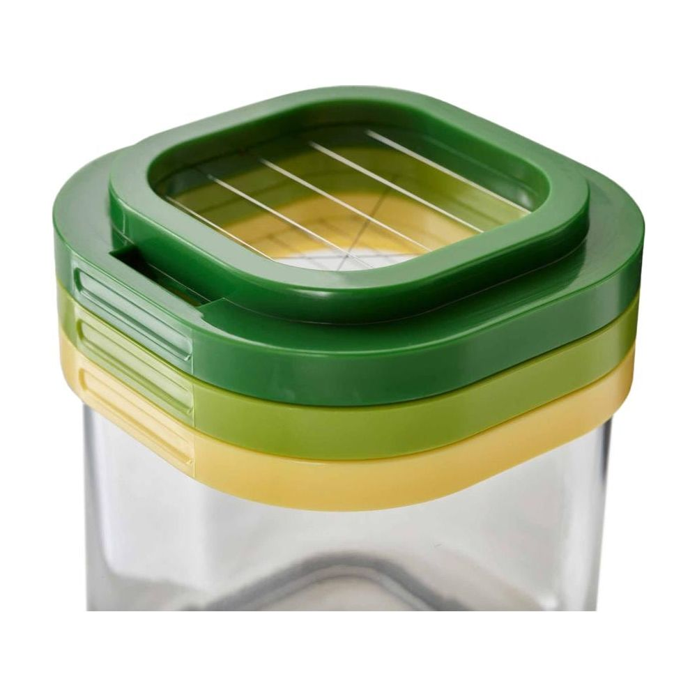Tritaripolla verde e giallo con contenitore trasparente.