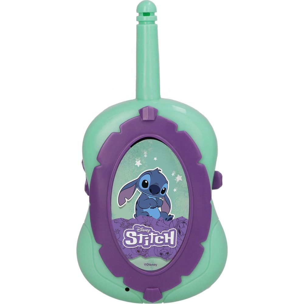 Grünes Spielzeugtelefon mit Stitch-Motiv, lilafarbener Rahmen, auf weißem Hintergrund.