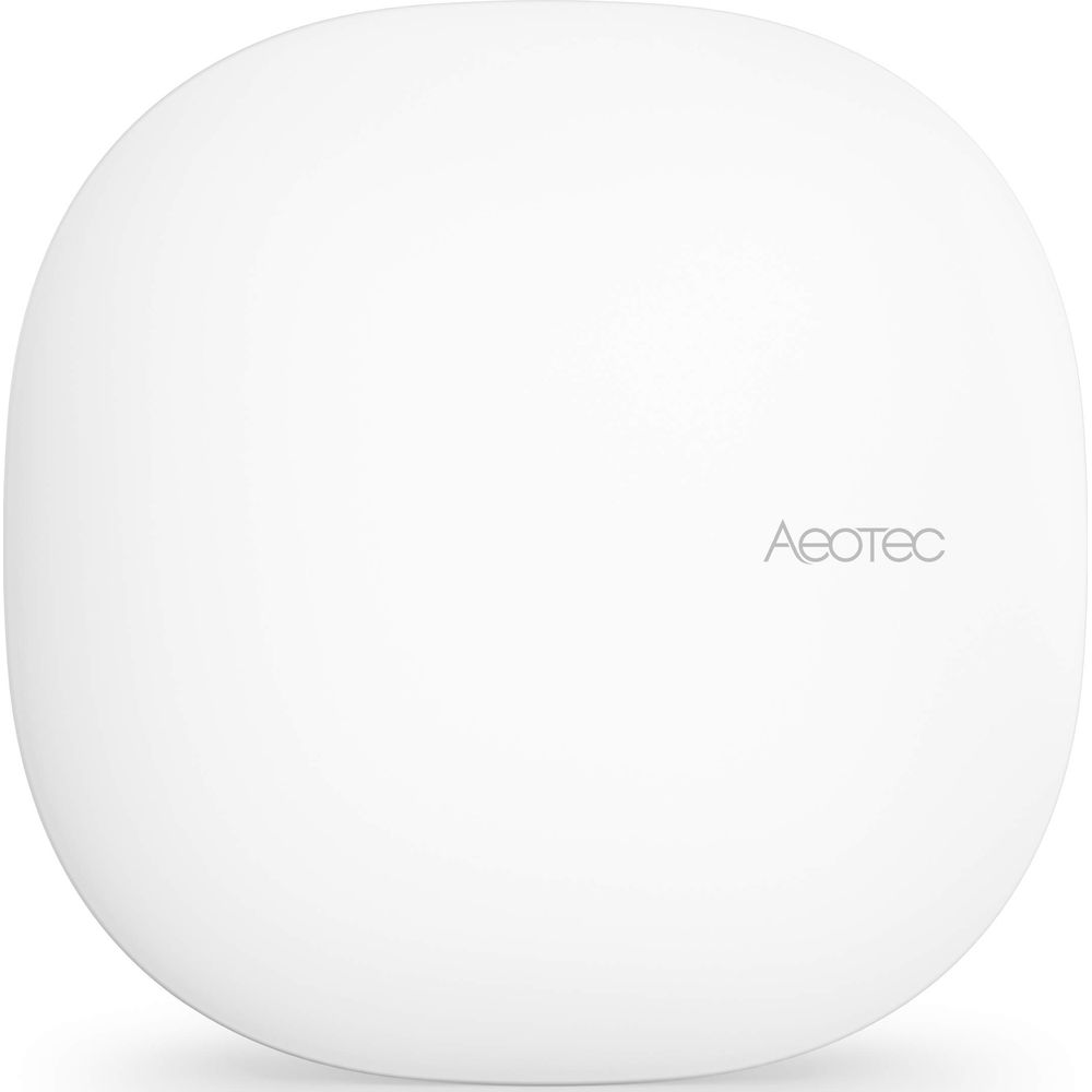 Białe, okrągłe urządzenie z logo Aeotec po prawej stronie.