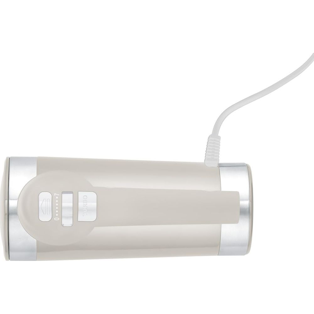 Een beige handmixer met zilveren accenten en een snelheidsregelaar van 0 tot 7.