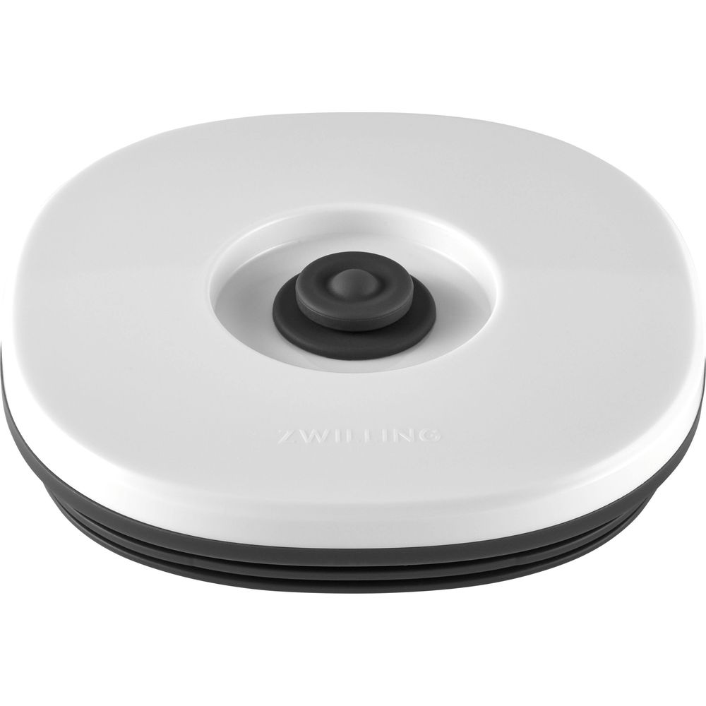 Biała pokrywa z czarnym zaworem pośrodku. Logo ZWILLING.