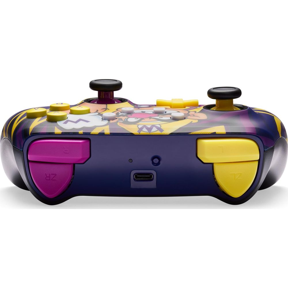 Ein lila Gamecontroller mit gelben und violetten Akzenten und Wario-Design.