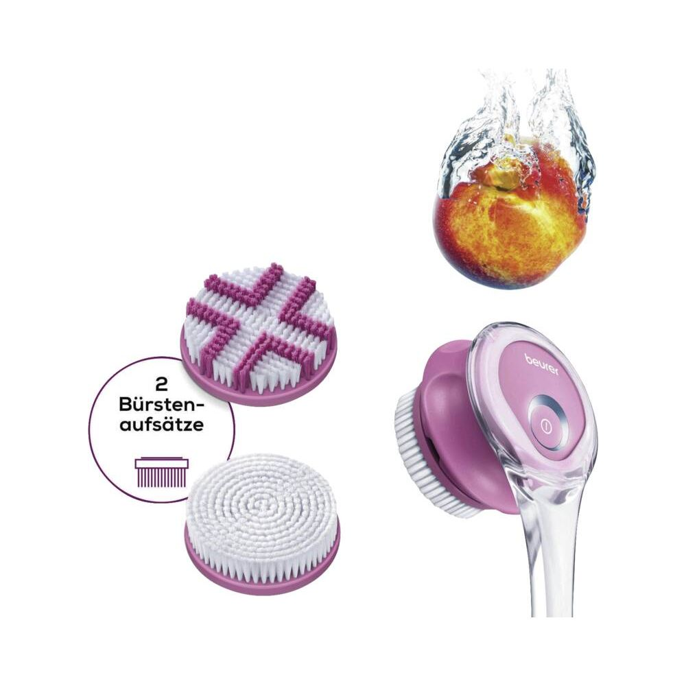 Un cepillo limpiador facial eléctrico rosa con accesorios y un melocotón en agua.