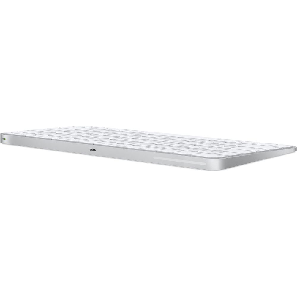 Ein schlankes, silbernes Apple Magic Keyboard mit weißen Tasten, isoliert auf weißem Hintergrund.