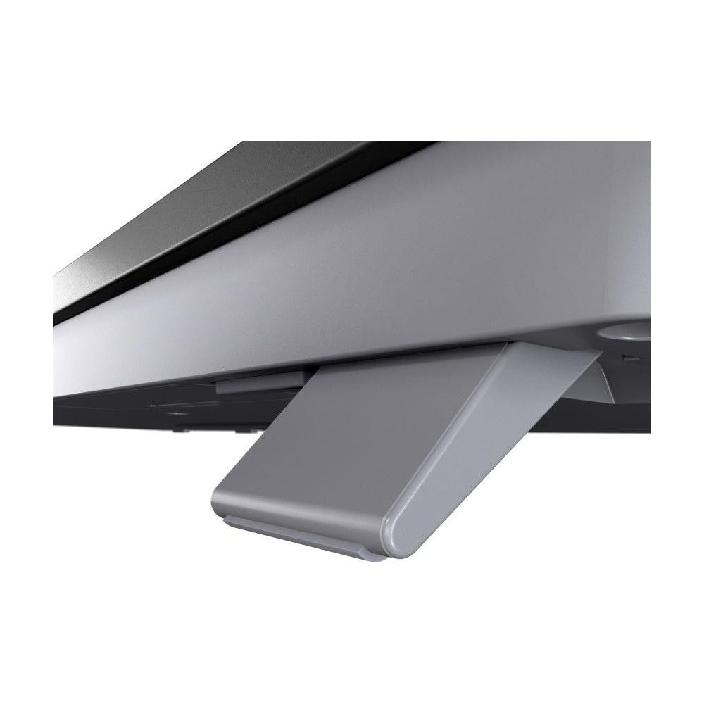 Szary rozkładany uchwyt na szarym urządzeniu elektronicznym.