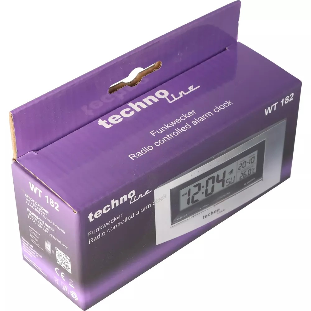 Scatola di cartone viola con display di sveglia radiocontrollata. Mostra le 12:04.