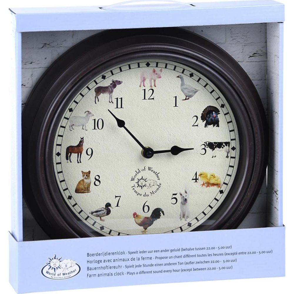 Une horloge ronde avec des animaux de ferme sur le cadran. Cadre sombre, chiffres clairs.