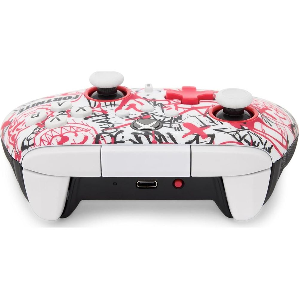 Ein weißer Controller mit rotem Graffiti-Design und schwarzen Akzenten.