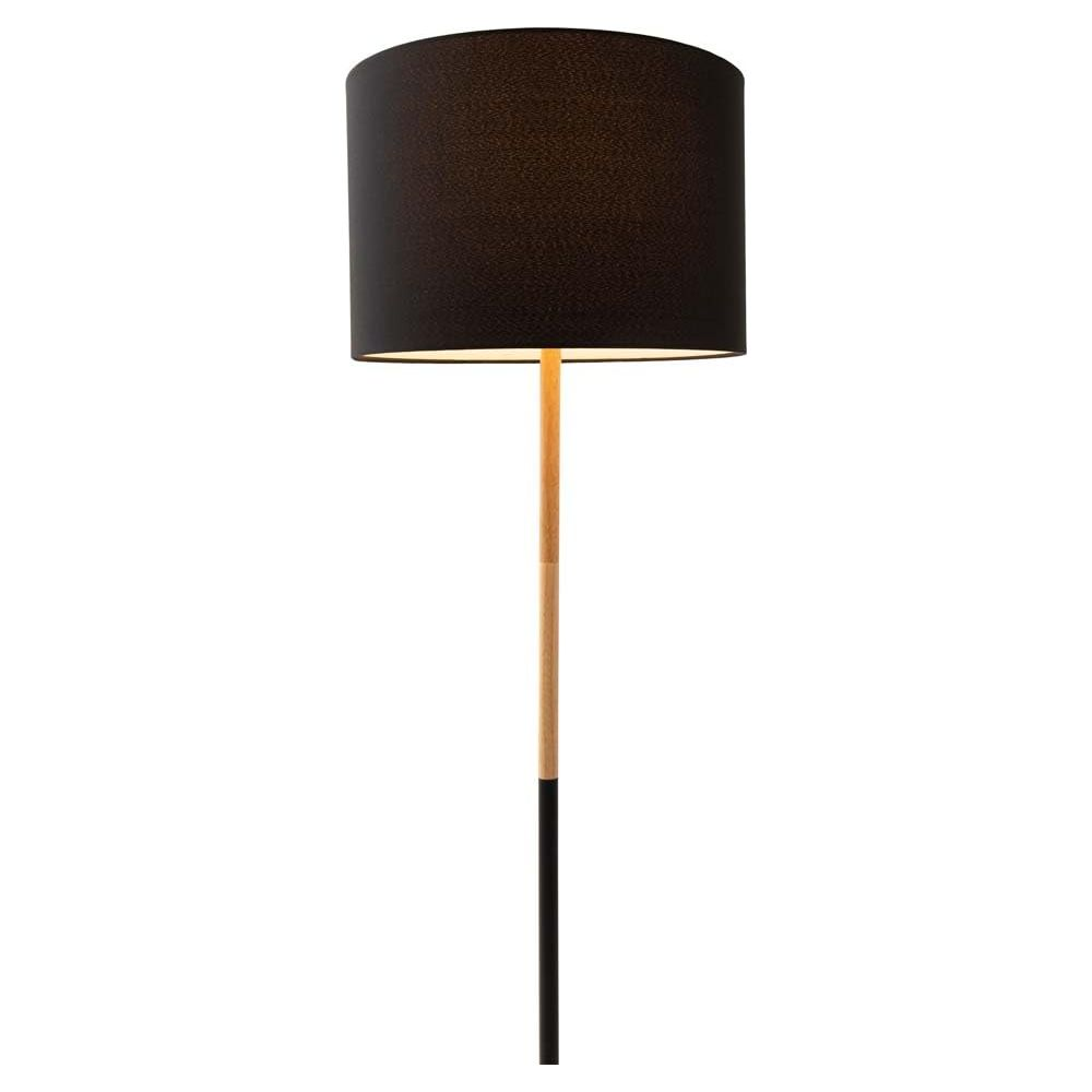 Un abat-jour noir sur un mât bicolore en bois et noir.
