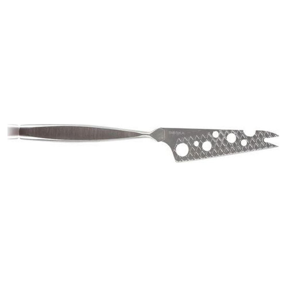 A silver cheese knife with holes and serrations at the end.