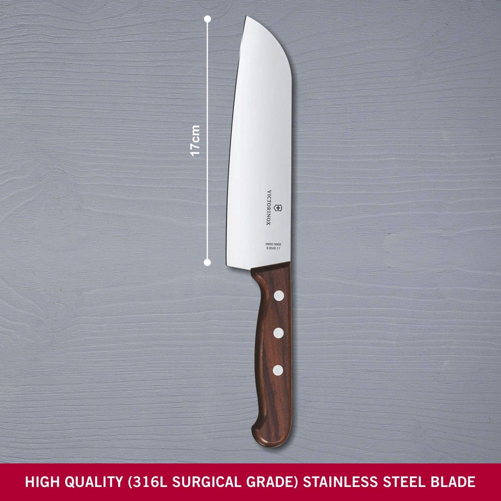 Ein 17cm Victorinox Kochmesser mit Holzgriff auf grauem Untergrund.