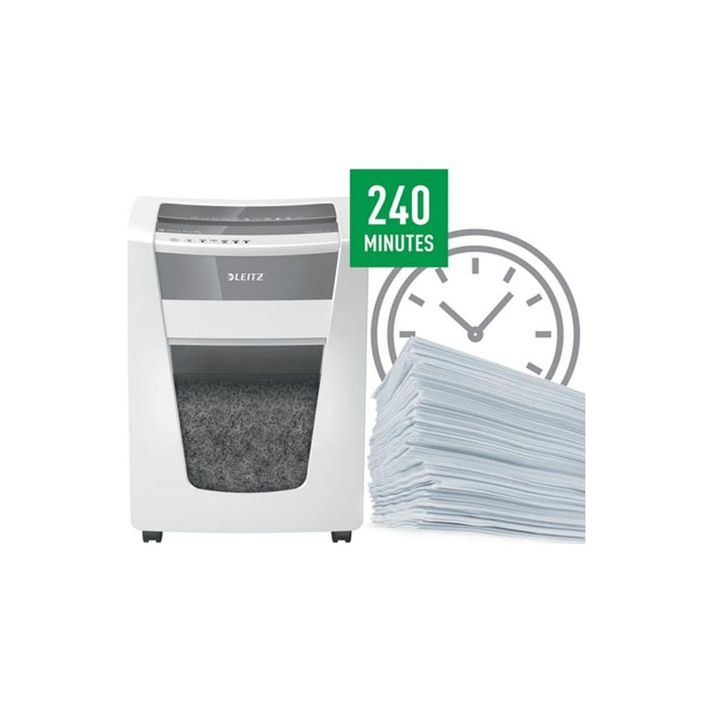 Une déchiqueteuse blanche à côté d'une pile de papier et d'une horloge indiquant 240 minutes.