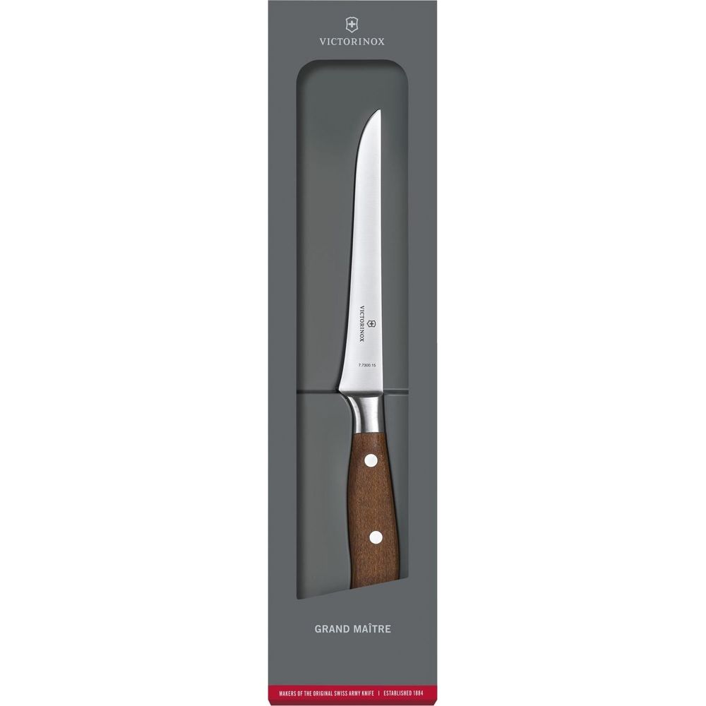Ein Victorinox Grand Maître Kochmesser mit Holzgriff in Geschenkverpackung.