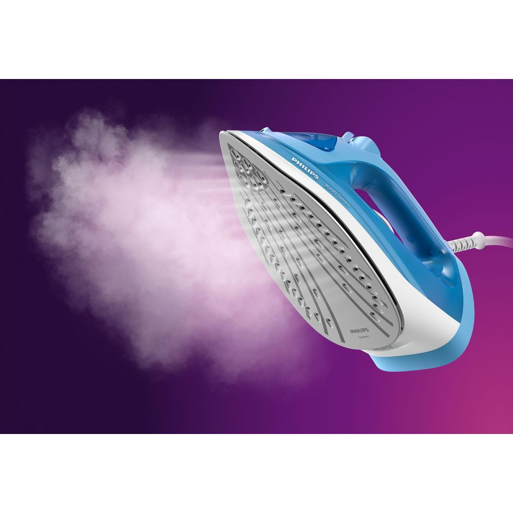 Eine blaue Philips-Dampfbügeleisen gibt Dampf ab, vor einem violetten Hintergrund.