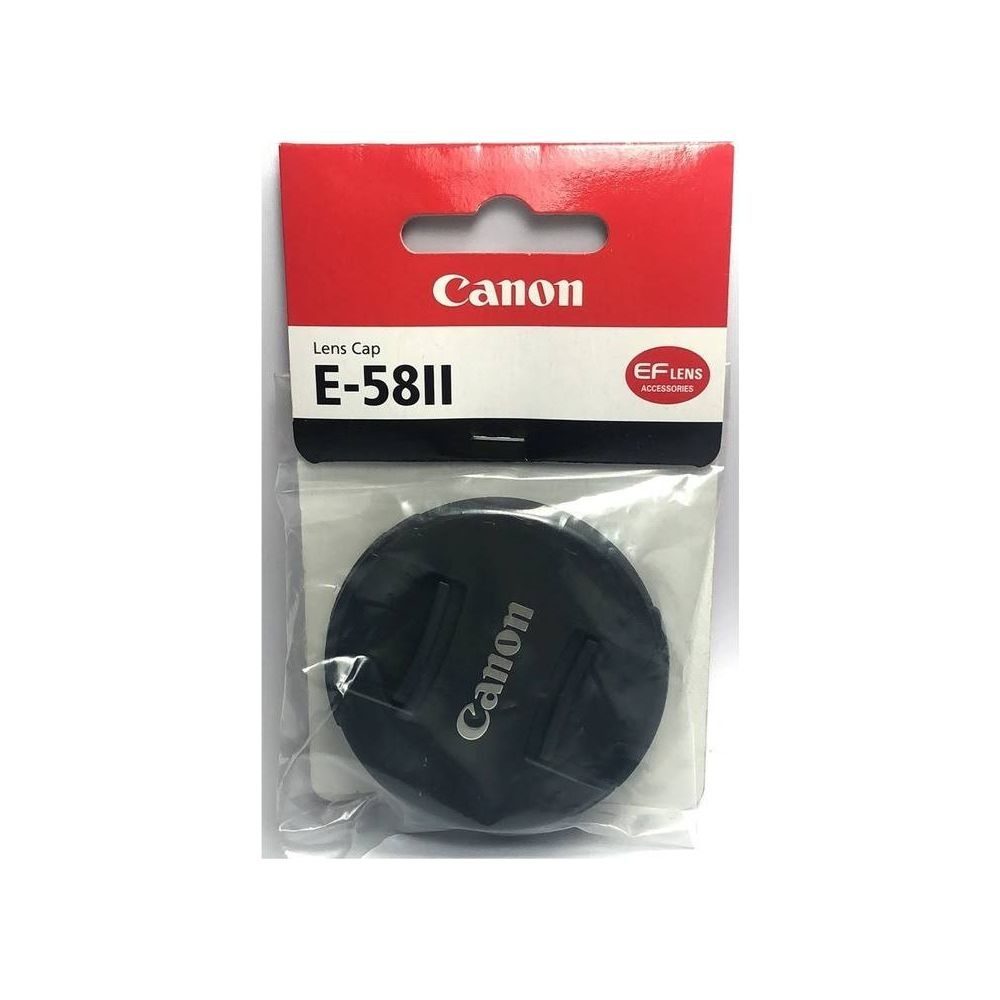 Czarna osłona obiektywu Canon E-58II w opakowaniu z czerwoną etykietą.