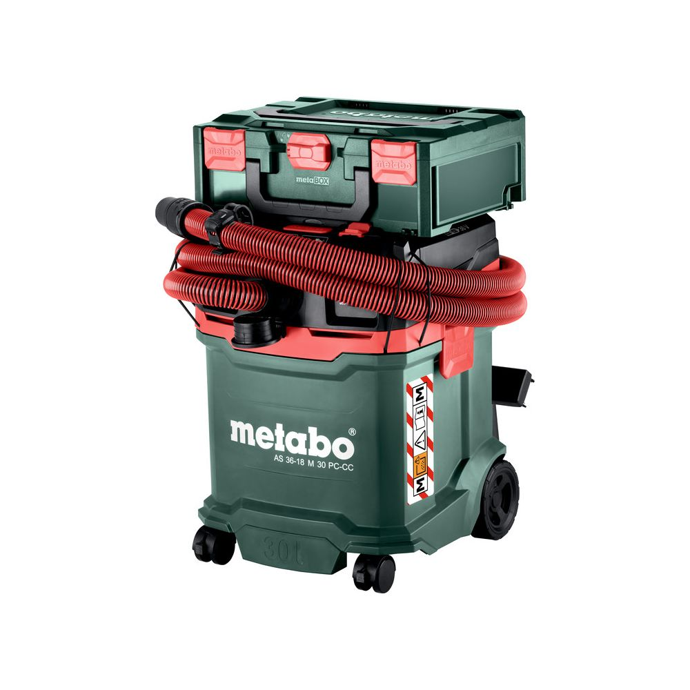 Un aspirapolvere Metabo verde con tubo rosso e box accessori.